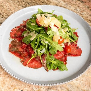 Carpaccio Con Rucola
